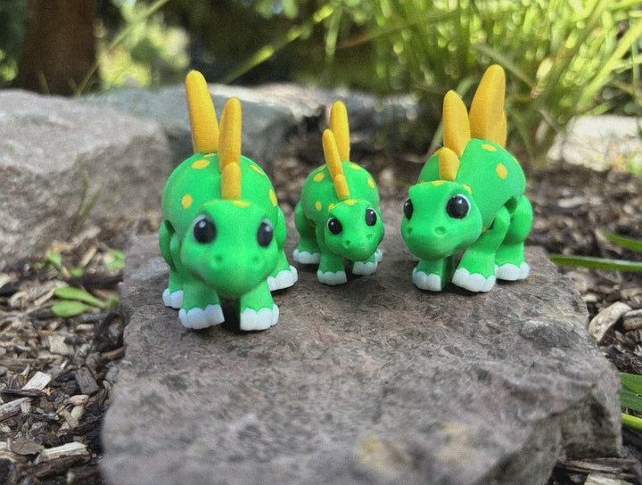 Sunny & Shadow, the Spiketail Stegos of Glimmer Fern Forest